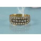 An antique yellow metal diamond and seed pearl set ring,