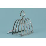 A silver four division toast rack (slightly bent), hallmarked Birmingham 1931,