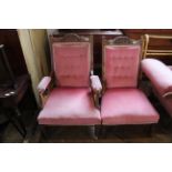 An Edwardian walnut framed and velvet upholstered lady's and and matching gent's chairs