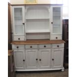 A 20th Century painted pine kitchen dresser with glazed top, approx.