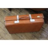 A vintage Revelation faux pig skin suitcase with chrome mounts