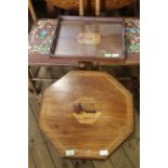 A mid 20th Century octagonal top mahogany coffee table with inlaid marquetry panel depicting a