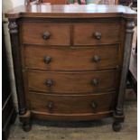 A large Victorian mahogany chest of two short and three long drawers with end columns