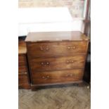 An early 19th Century mahogany chest of three drawers (top as found)