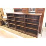 A late 19th Century oak bookcase with fixed shelves, approx.