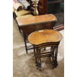 A small oak gate leg table and a nest of three tables with burr walnut tops