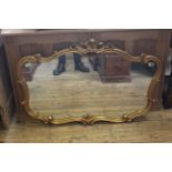 A 20th Century ornate gilt framed mirror in the Rococo style, approx.