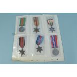 Twelve various medals including WWI examples
