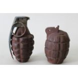 A U.S.A. Mk II 'pineapple' grenade (inert) with a British 'as found' Mills example
