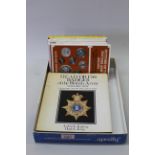 Eight various volumes on British badges,