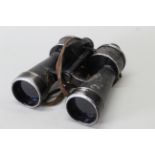 A pair of WWII era German binoculars marked 7x50 BEH, S/No.354874(T) K.F.