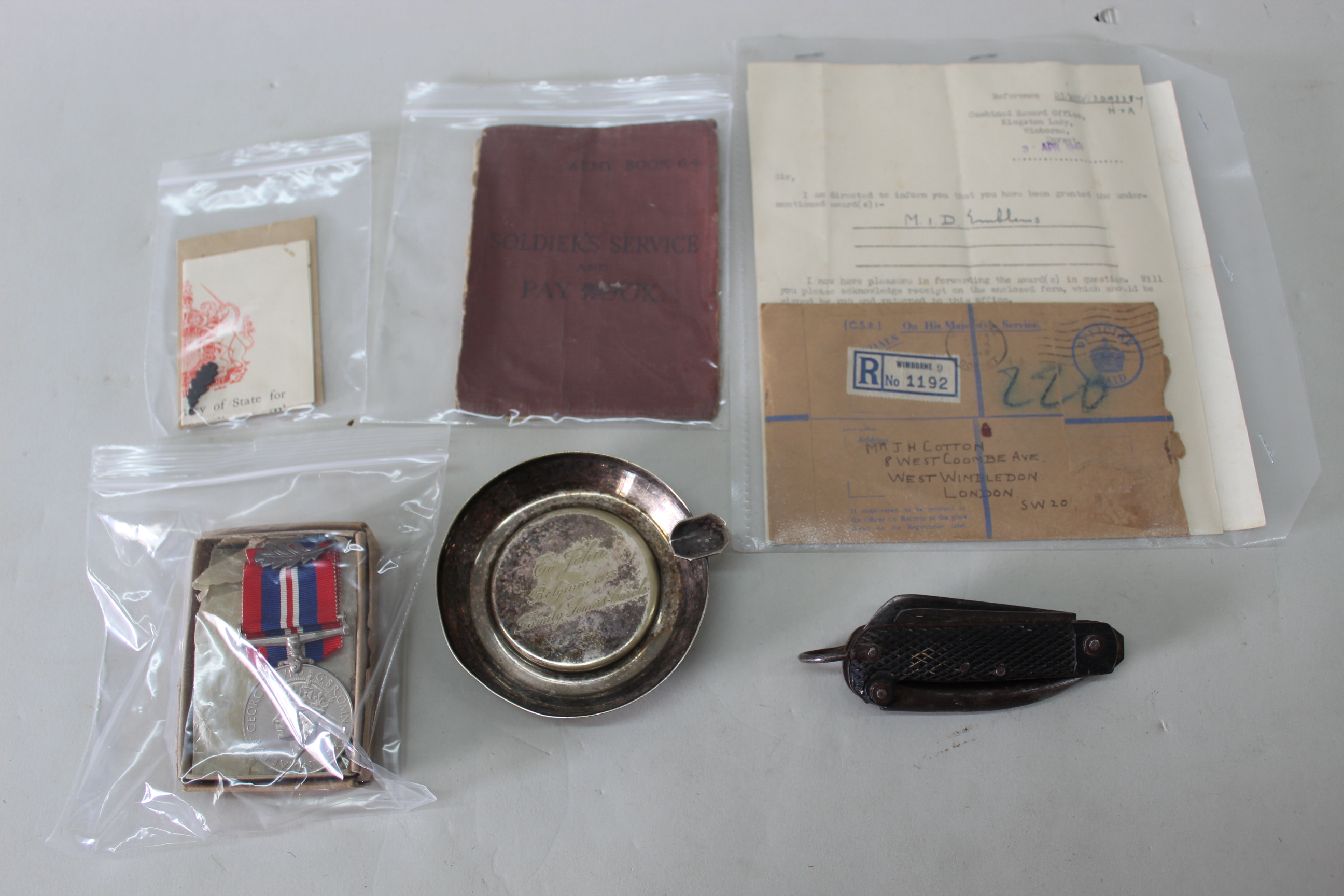 A WWII group of four medals in original box of issue, France and Germany Star 39/45,