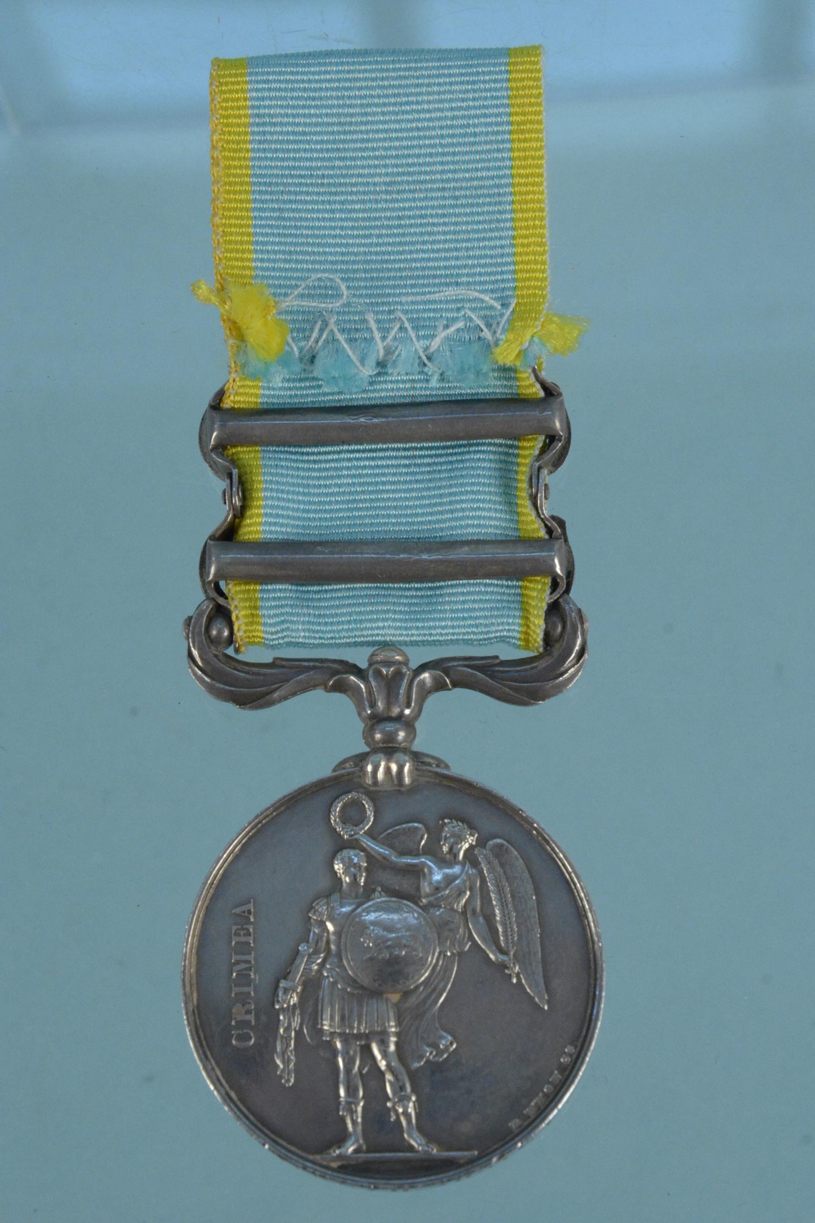 A Crimea medal with Inkermann and Alma clasps to Michl Hannaway 44th Regt - Image 3 of 4
