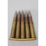 Five inert rounds of .55 boys anti tank rounds (all dated 1942) within a 1940 dated clip