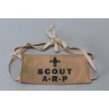 An armband marked 'Scout A.R.P.