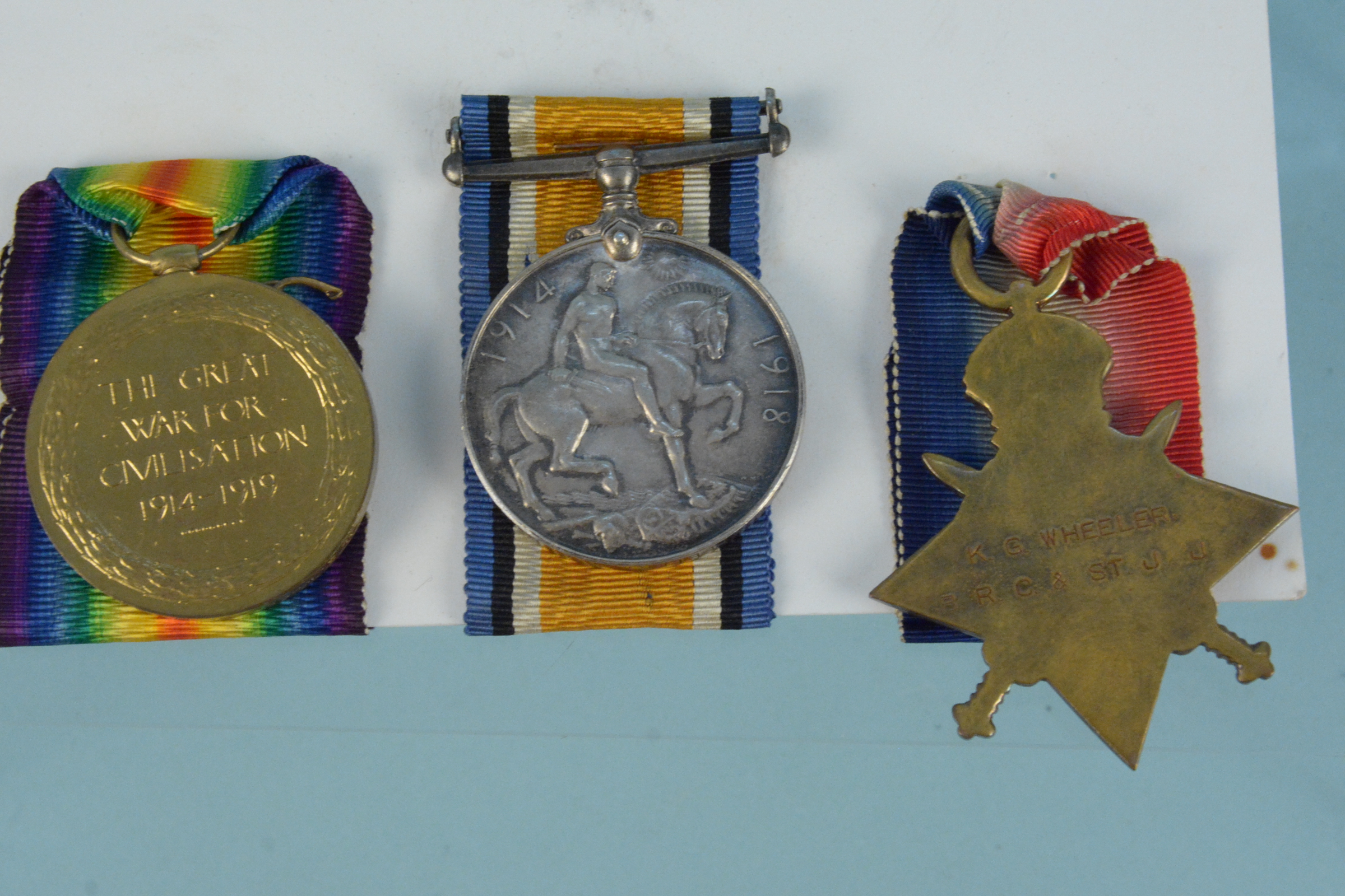 A WWI 14/15 Star trio, Star to K.G.Wheeler B.R.C. & ST.J.J. with pair to K.G.Wheeler V.A.D. - Image 3 of 3