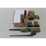 Six boxes of .303 cal blank cartridges, 'drill rounds' plus a canvas bandolier with a No.