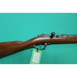 A Mauser model 1871 bolt action rifle in 11mm cal, this is a later sporterized example dated 1875,