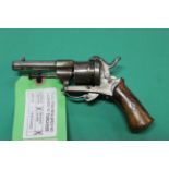 A six shot 7mm pin-fire revolver,
