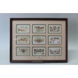 A display of nine WWI era silk postcards,