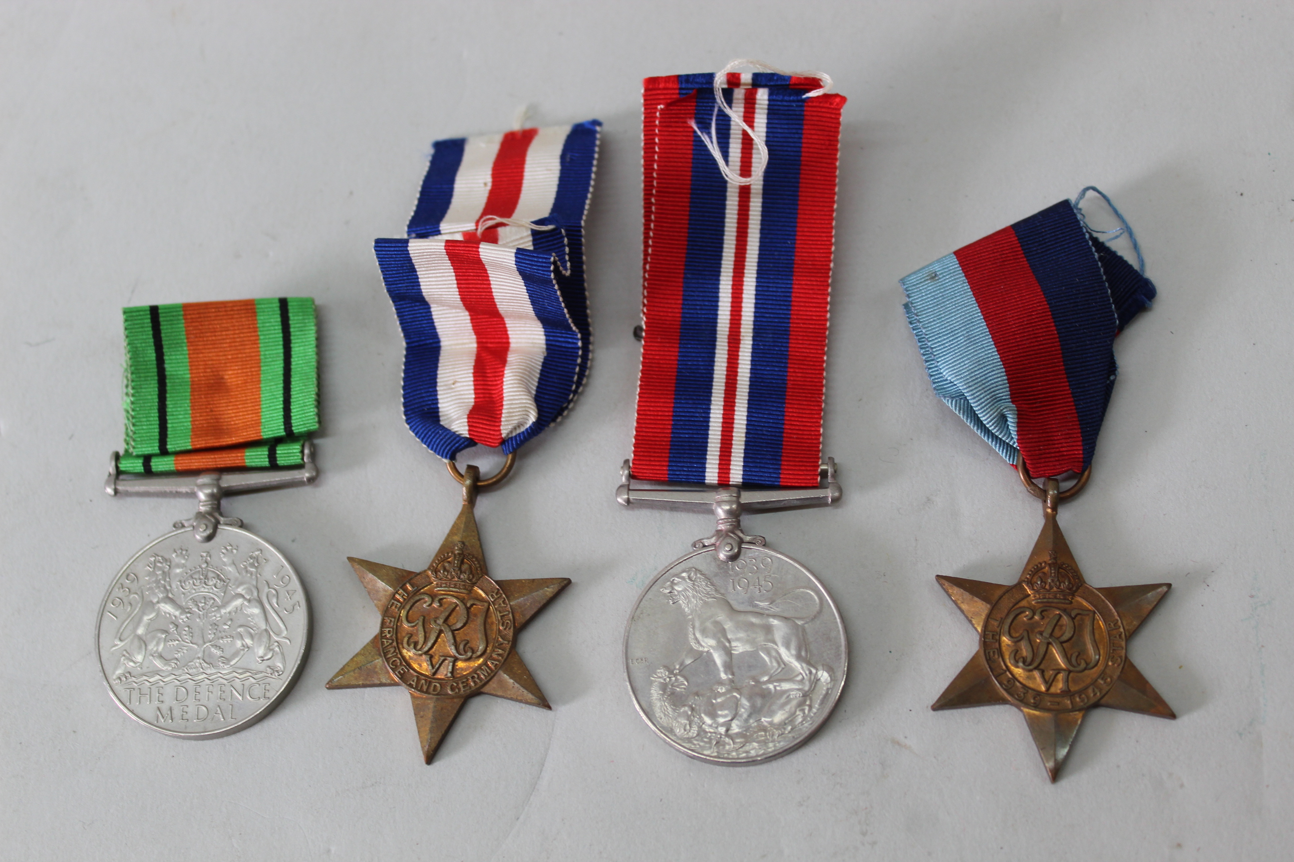 A WWII group of four medals in original box of issue, France and Germany Star 39/45, - Image 2 of 3