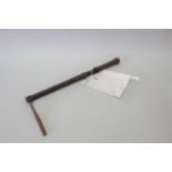An early 20th Century weighted and sprung cosh/swagger stick, 20 1/4" overall,