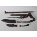 Four ethnic knives including Kukri and a Kris