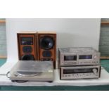 A Pioneer stereo turntable model PL-512, a Pioneer cassette tape deck CT-F600,