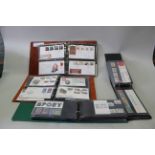 Seven well filled albums of first day cover stamps plus two albums of stamp sets 1970's/80's