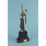 An Art Deco style composition and gilded metal mounted figure of a dancing lady