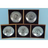 A set of five framed silver plated dishes with animal heads after Bernard Buffet