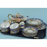 A Japanese porcelain hand painted tea set of twenty one pieces