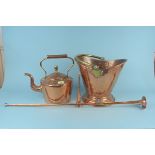 A 19th Century copper kettle, a copper helmet coal scuttle,