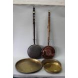 Two Indian brass trays plus one other,