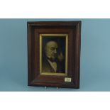 An oak framed tile picture inscribed on back 'Made by Sherwin & Cotton, Hanley,