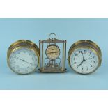 A Kevin Hughes quartz ships clock and barometer plus a quartz brass carriage clock