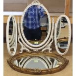 A gilt framed oval wall mirror plus a painted tri-fold dressing mirror