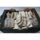 A large collection of world stamps housed in envelopes, mostly early 20th Century,