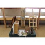 A selection of artists materials including table easels, a full height easel,