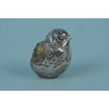 A silver pin cushion of chick form, Chester hallmarked,