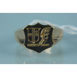 A gents 9ct gold signet ring with engraved crest, size L,