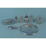 A silver hand mirror plus a quantity of silver and cut glass dressing table bottles/jars