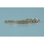 A 9ct gold ID bracelet with engraved name and dedication,
