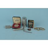 A mixed lot of collectables including a white metal retractable toothpick,