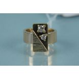 A 9ct gold ring with rectangular panel centre,