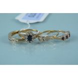 Four stone set 9ct gold rings,