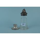 A glass silver lidded sifter plus a small silver inkwell
