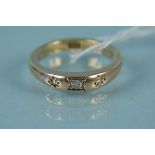 A 9ct gold three stone diamond ring, size K, weight approx 3.