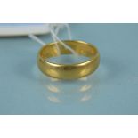 A 22ct gold wedding band, size P, weight approx 6.