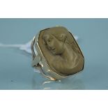 A 9ct gold lava cameo set ring, size O 1/2,